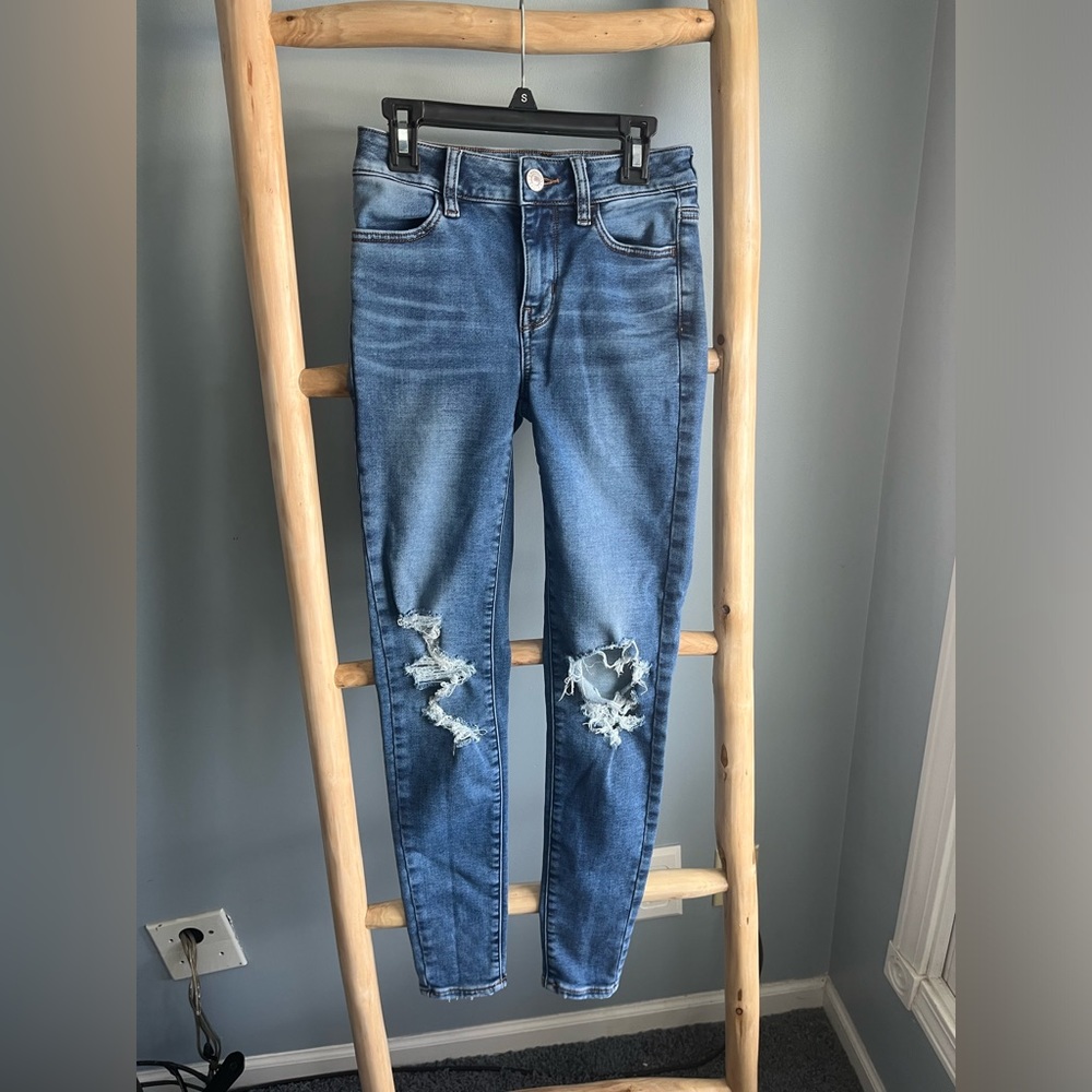 American Eagle mid rise skinny jeans.